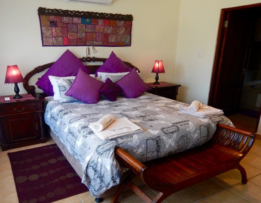 A further double bedroom finished in warm tones