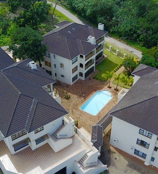 Aerial view of the complex and swimming pool