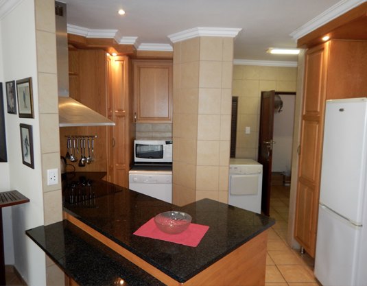 Kitchen with granite tops and an island