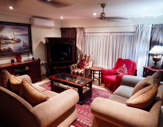 Lounge with sofas and fireplace